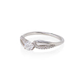 14kt diamond engagement ring set with round center diamond and side diamonds, 25cttw.