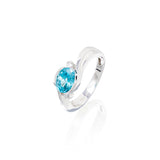 BLUE TOPAZ WITH DIAMONDS, BT 8X6, 2 D .03CTW, 14KTWG, SEMI BYPASS STYLE RING.