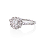 18kt white gold diamond bouquet engagement ring. 45 diamonds at 0.54cttw with halo. Diamonds are G-H Color, SI Clarity Grade.