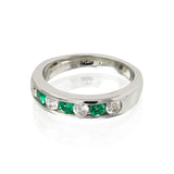 LADIES PLATINUM 4DI.44CT/3 EMER.30CTT.W.          CHANNEL BAND