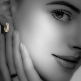 14kt rose gold double row pave diamond huggie earrings. 0.25cttw, G-H Color, SI Clarity.