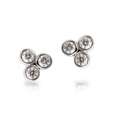 14kt white gold stud with 3 bezel set diamonds. I-J color, I1 clarity