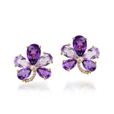 18kt rose gold flower petal stud earrings with diamond stem. Earrings consist of six purple amethyst at 3.40cttw and four pink amethyst at 1.90cttw and 12 diamonds at 0.08cttw. G-H,SI
