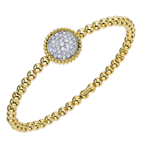18kt yellow gold beaded cuff bracelet with round diamonds.
