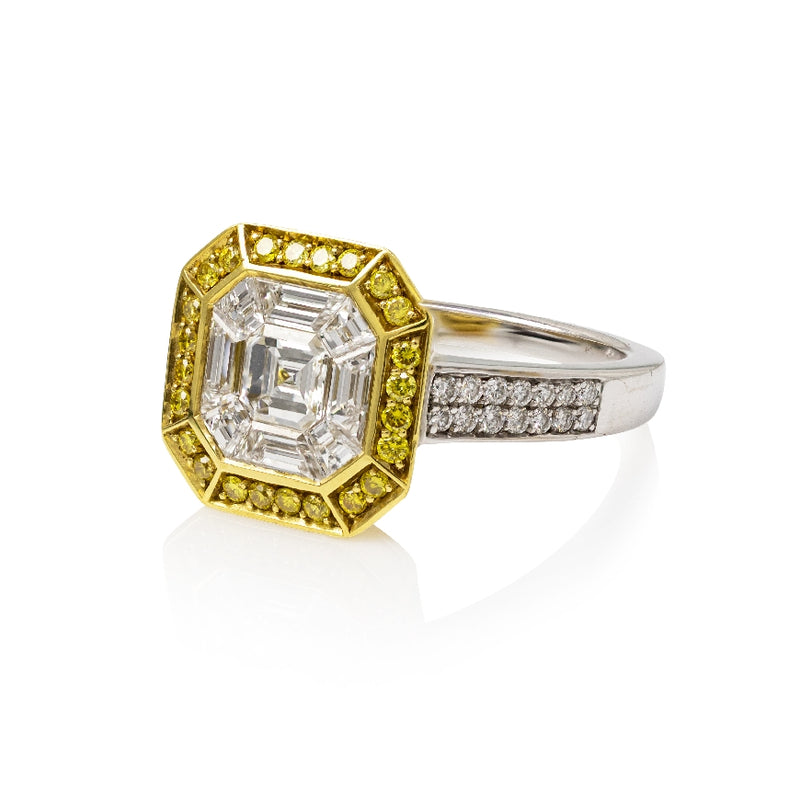 18K GOLD RING SET WITH TRAPEZOID, EMERALD CUT     BAGUETTES, SURROUNDED WITH FYD, 1.51CTTW.