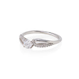 14kt diamond engagement ring set with round center diamond and side diamonds, 25cttw. 