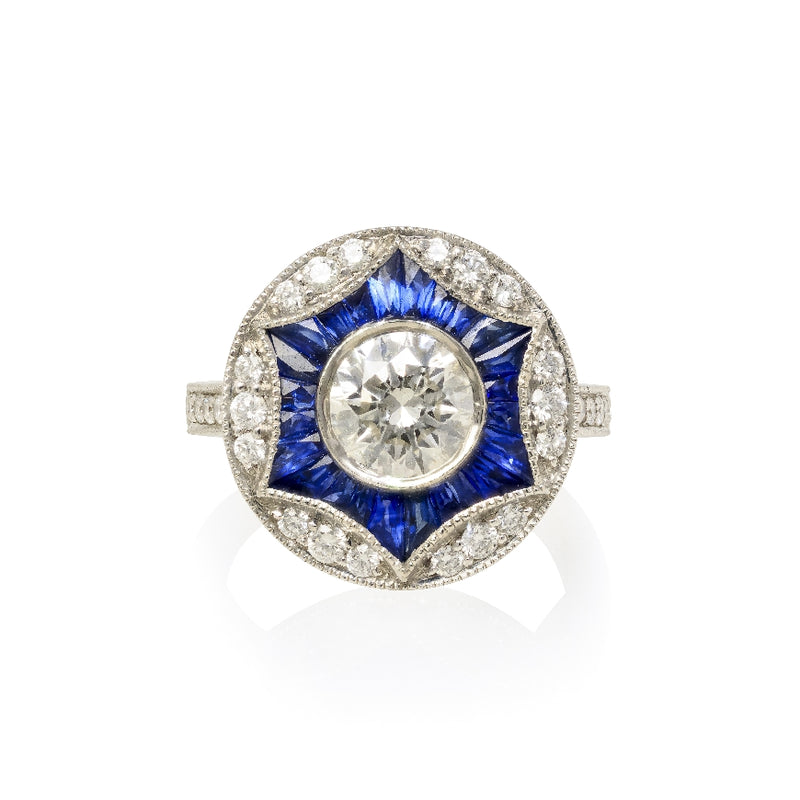 Diamond and blue sapphire ring, art deco style.  Ring consists of .21ct. of diamond and 1.26cttw of blue sapphire.  special cuts.  Color of diamonds is G-H/SI and all are set into a platinum mounting.  D 1.26ct G si2. GIA