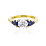 LADY'S 18K YELLOW GOLD & PLATINUM 3- STONE RING, with CZ center and KITE SHAPE blue SAPPHIRES. 1.20CTW
