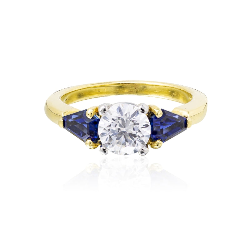 LADY'S 18K YELLOW GOLD & PLATINUM 3- STONE RING, with CZ center and KITE SHAPE blue SAPPHIRES. 1.20CTW