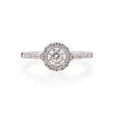 18kt wg  round diamond 0.50 ct ring G-H/SI1with diamonds pave set around bezel and on shank 0.26cttw