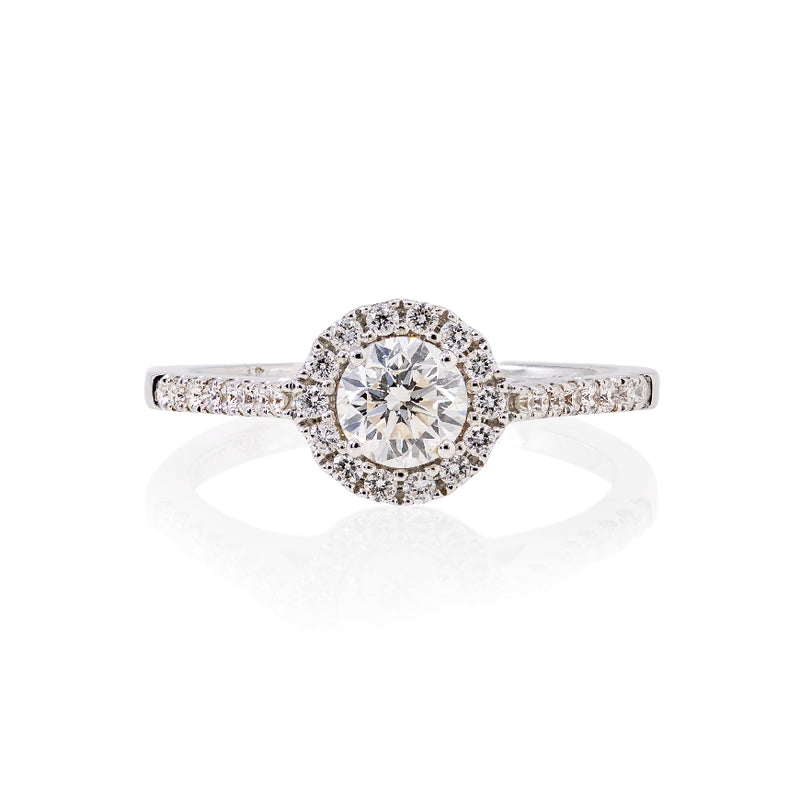 18kt wg  round diamond 0.50 ct ring G-H/SI1with diamonds pave set around bezel and on shank 0.26cttw