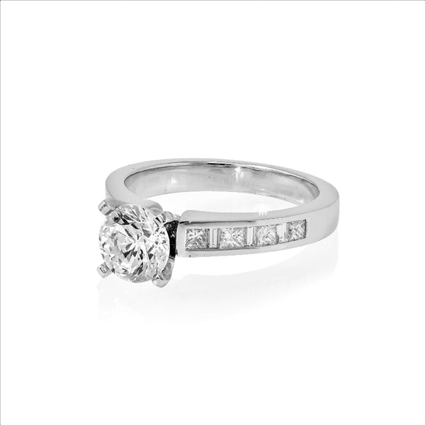 Solitaire Engagement Ring with Channel Set Band