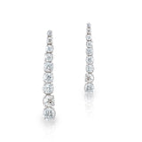 14kt white gold and diamond graduated line earrings with a total of 18 diamonds totalling 2.0cttw.  Each diamond is set with 4 prongs and on a post, H color, I2 clarity