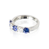 Platinum 5 stone mutual prond set ring with 3 round Sapphires 1.22cttw and 2 round diamonds 0.59cttw G/VS2-SI1