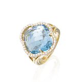 14kt Yellow Gold ring with Split Shank and Clover shaped honey comb blue topaz and diamond halo. Diamonds weigh 0.30 ctw 