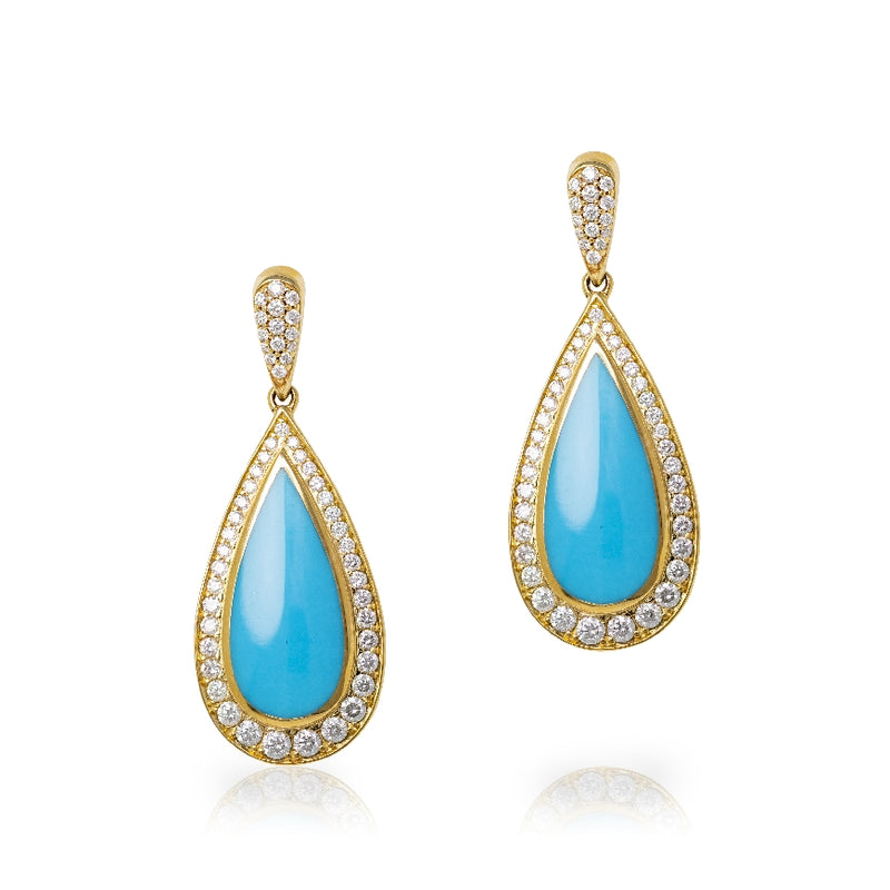 14kt yellow gold pear shaped turquoise drop style earrings surrounded by 1.04 cttw of diamonds. G-H Color, SI Clarity.
