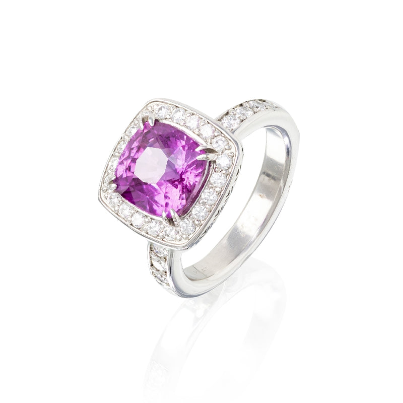 Cushion Pink Sapphire 4.04ct and diamond ring.  Custom made by Addessi.  Diamonds: 10 @ .03ct each=.30cttw., 20 diamonds @ .30cttw., 22 diamonds @ .16cttw. all total diamonds are .76cttw. G color VS 1-2.  Ring is crafted in platinum with claw prongs.
